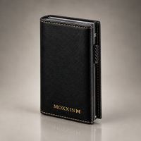Moxxin black leather pop-up wallet, closed, with gold embossed logo and gold stitching