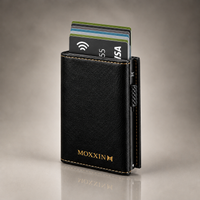Moxxin black leather pop-up wallet with the cards up, raised from the aluminium pop-up case